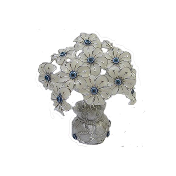 WHITE FLOWER W/BLUE EYES ON MONEY BAG BASE