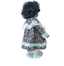 Load image into Gallery viewer, Vintage Brinns Porcelain Doll Black Curly Hair Floral Dress Soft Body - 13" tall
