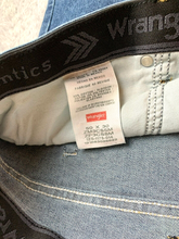Load image into Gallery viewer, Wrangler Jeans Adult 50x30 Blue Whiskered Stretch Baggy Denim ZM3CSSM Mens NWT
